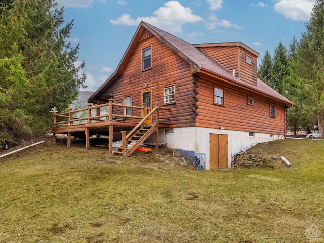 142 Pangman Rd, Gilboa, NY 12076 - back of house featuring a yard, a wooden deck, log siding, and stairway