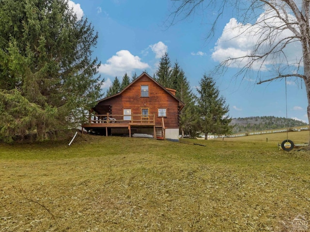 142 Pangman Rd, Gilboa, NY 12076 - back of house with a wooden deck, a lawn, and log siding