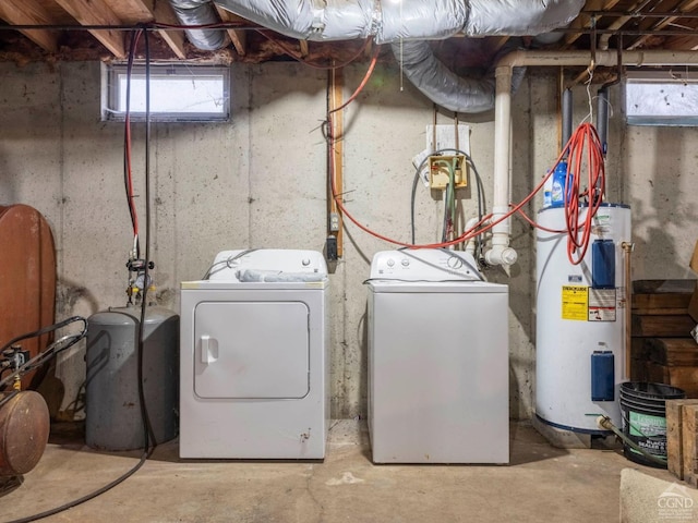 142 Pangman Rd, Gilboa, NY 12076 - laundry room with water heater, washer and clothes dryer, and oil tank