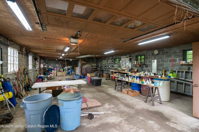 623 Rte 9j, Stuyvesant, NY 12173 - garage with a workshop area and concrete block wall