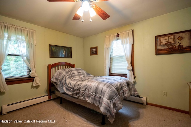 623 Rte 9j, Stuyvesant, NY 12173 - carpeted bedroom with a baseboard radiator and a ceiling fan