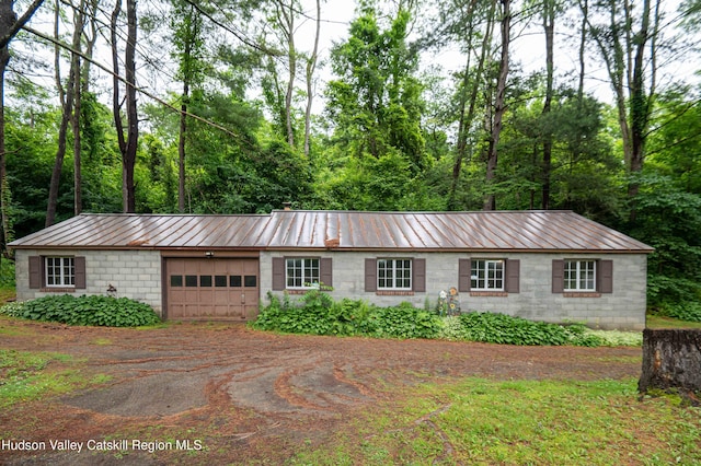 623 Rte 9j, Stuyvesant, NY 12173 - ranch-style home featuring a garage, concrete block siding, driveway, and a metal roof