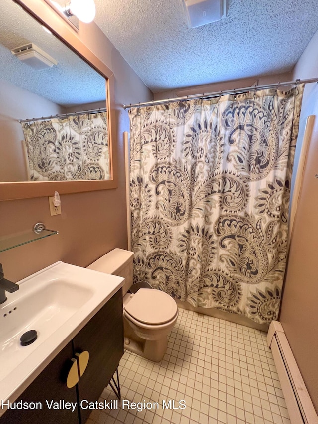 bathroom with toilet, tile patterned flooring, a textured ceiling, and a baseboard heating unit