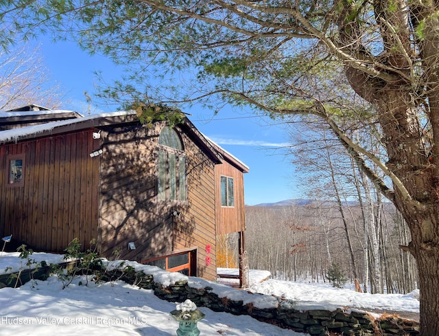 view of snow covered property