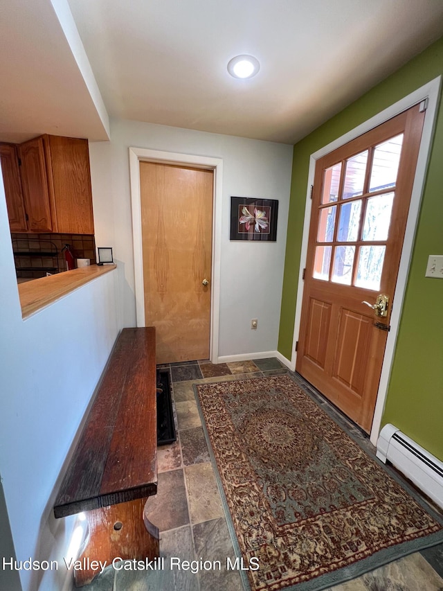 entryway featuring a baseboard radiator