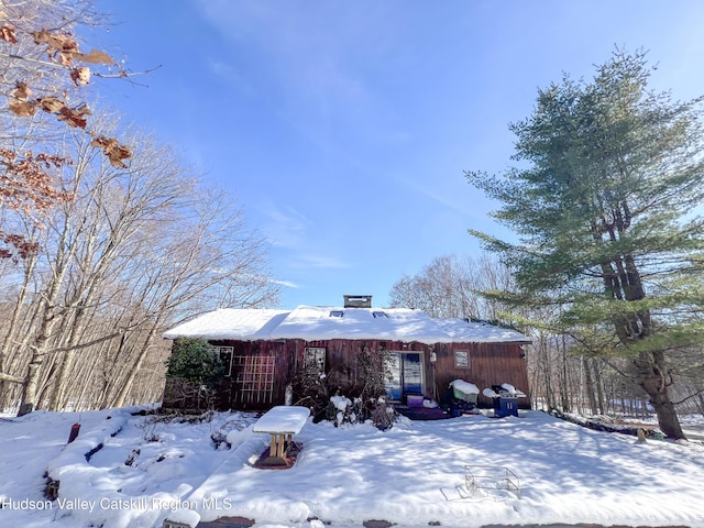 view of snow covered house