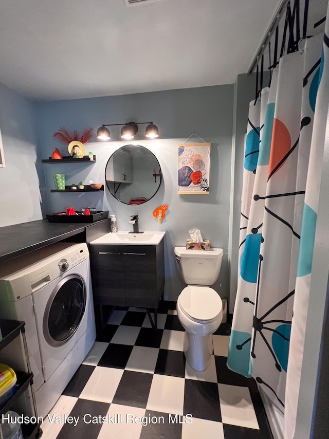 laundry area featuring washer / dryer and sink