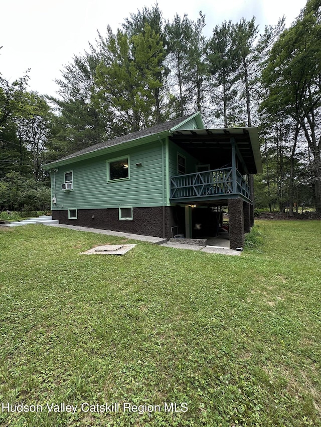 20 Kelder Rd, Olivebridge, NY 12461 - view of side of property with a deck, a lawn, and view of scattered trees