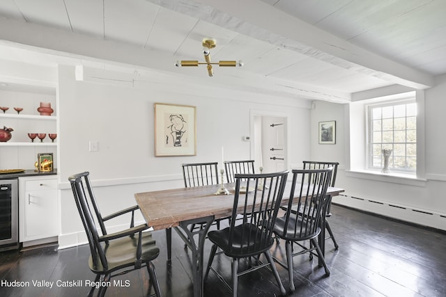 dining area with beamed ceiling, dark wood-type flooring, beverage cooler, and a baseboard radiator