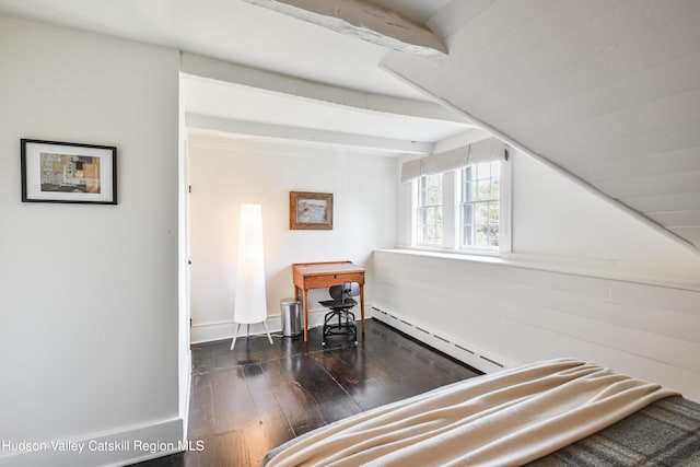 bedroom featuring beamed ceiling, dark hardwood / wood-style flooring, and a baseboard heating unit