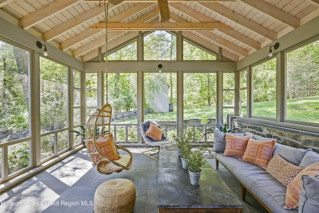 sunroom with lofted ceiling with beams and wood ceiling