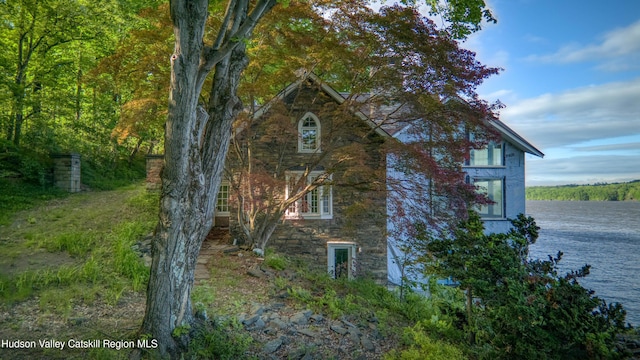 70 Floyd Ackert Rd, West Park, NY 12493 - view of home's exterior featuring stone siding and a water view