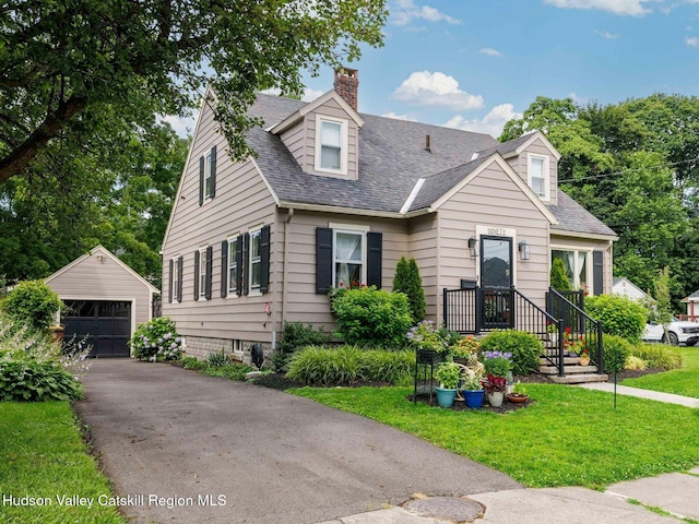 90 Emerson St, Kingston, NY 12401 - cape cod home with an outdoor structure, a shingled roof, a chimney, a front lawn, and a garage