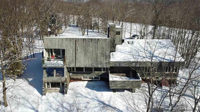 view of snow covered property