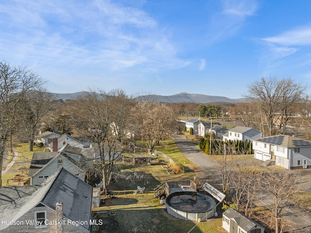 drone / aerial view featuring a mountain view