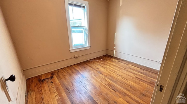 801 Columbia St, Hudson, NY 12534 - empty room featuring healthy amount of natural light, light wood-style floors, and baseboards