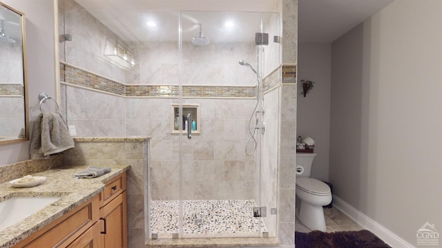 174 Webber Rd, Coxsackie, NY 12058 - full bathroom with a shower stall, vanity, toilet, and baseboards