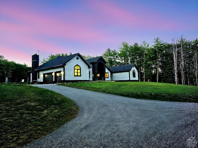 174 Webber Rd, Coxsackie, NY 12058 - view of front facade featuring a chimney, a front lawn, and curved driveway