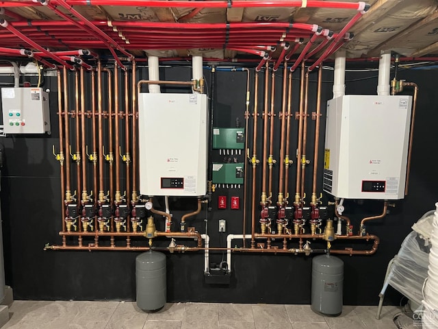 174 Webber Rd, Coxsackie, NY 12058 - utility room featuring tankless water heater