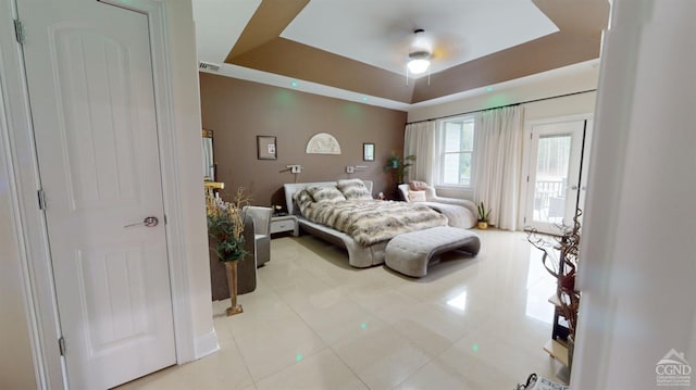 174 Webber Rd, Coxsackie, NY 12058 - bedroom featuring tile patterned floors, access to outside, and a tray ceiling