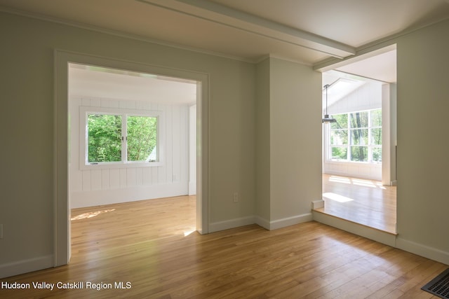 11351 State Rte 22, Austerlitz, NY 12017 - spare room featuring hardwood / wood-style flooring, baseboards, and crown molding