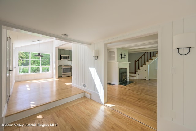 11351 State Rte 22, Austerlitz, NY 12017 - hallway featuring light wood-style flooring and stairs