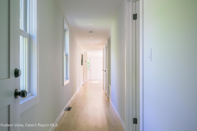 11351 State Rte 22, Austerlitz, NY 12017 - corridor featuring light wood-type flooring and baseboards