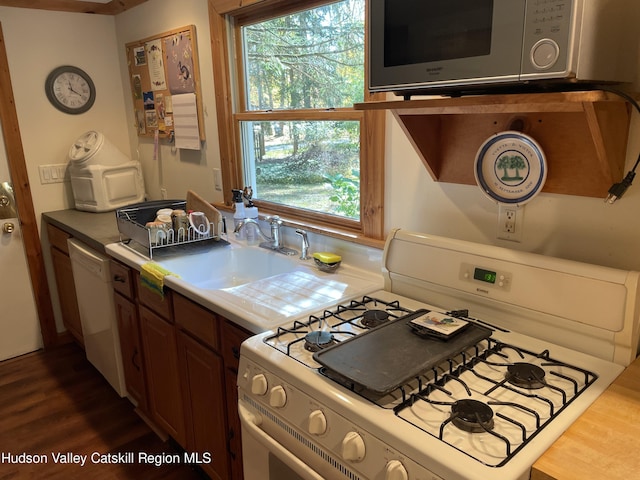 89 Bloomingdale Rd, Tillson, NY 12486 - kitchen featuring white appliances, healthy amount of natural light, and dark wood-style floors