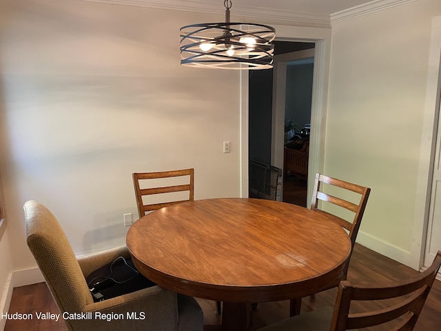 89 Bloomingdale Rd, Tillson, NY 12486 - dining space featuring a chandelier, dark wood-style flooring, crown molding, and baseboards