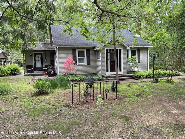 89 Bloomingdale Rd, Tillson, NY 12486 - view of front facade with roof with shingles