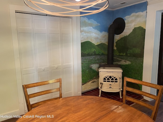 89 Bloomingdale Rd, Tillson, NY 12486 - dining space featuring a wood stove and tile patterned floors
