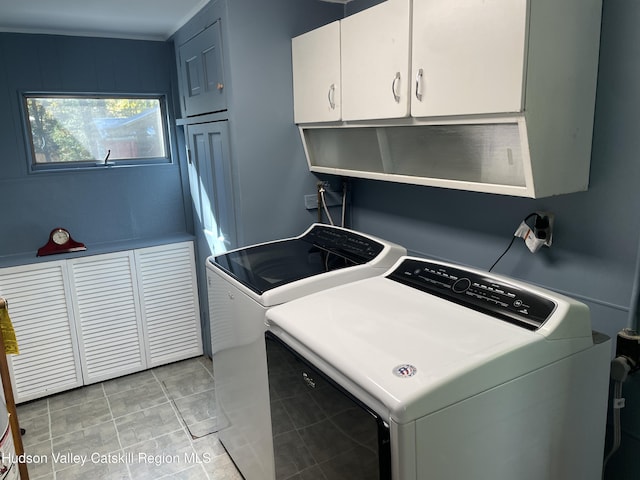 89 Bloomingdale Rd, Tillson, NY 12486 - washroom with cabinet space, washer and clothes dryer, and light tile patterned floors