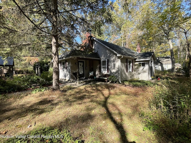89 Bloomingdale Rd, Tillson, NY 12486 - rear view of house with a chimney