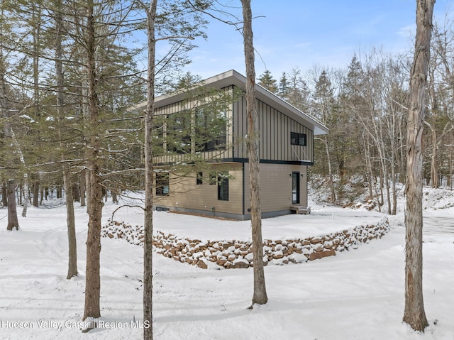 view of snow covered property