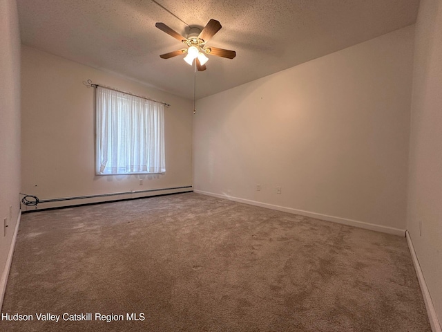 spare room featuring ceiling fan, baseboard heating, a textured ceiling, and carpet floors