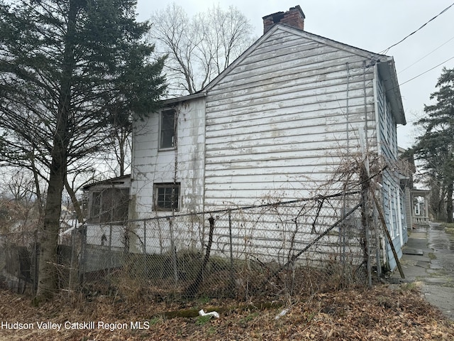 11 N Montgomery St, Athens, NY 12015 - view of side of property with a chimney