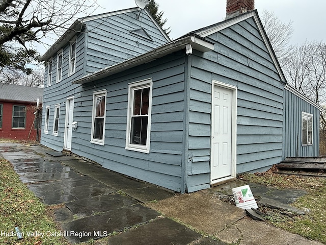 11 N Montgomery St, Athens, NY 12015 - view of side of property featuring a chimney