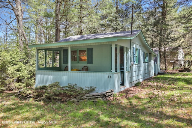 view of home's exterior featuring a shingled roof