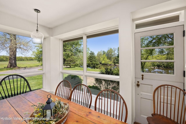 sunroom / solarium with a wealth of natural light