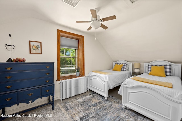 bedroom featuring ceiling fan, radiator heating unit, and vaulted ceiling