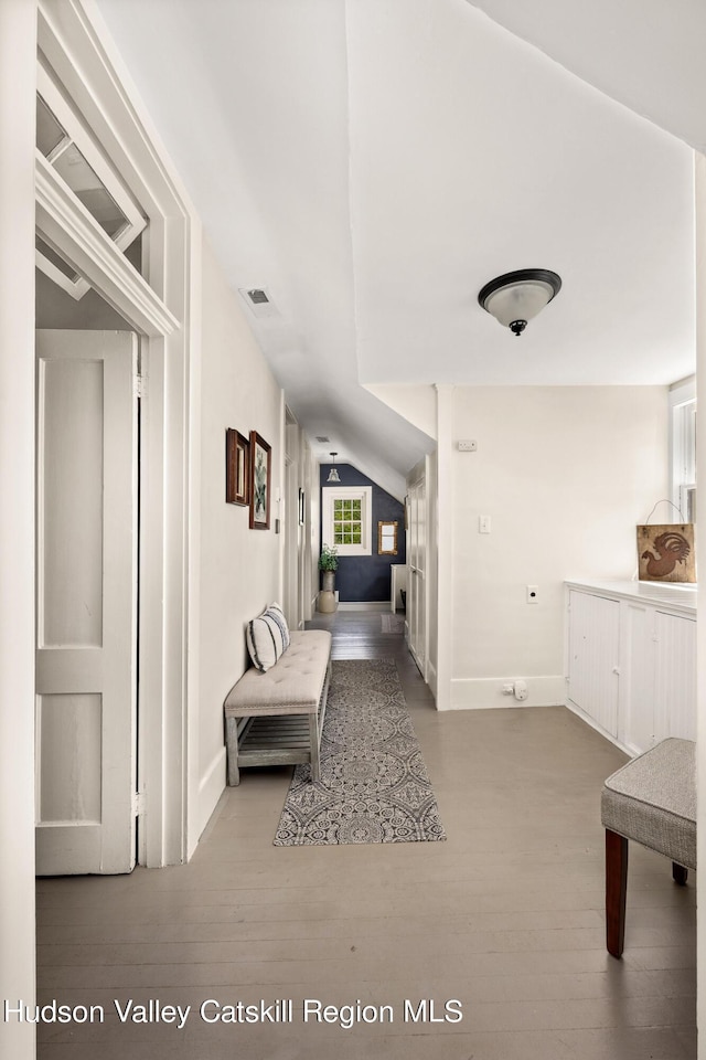 hallway featuring light hardwood / wood-style flooring