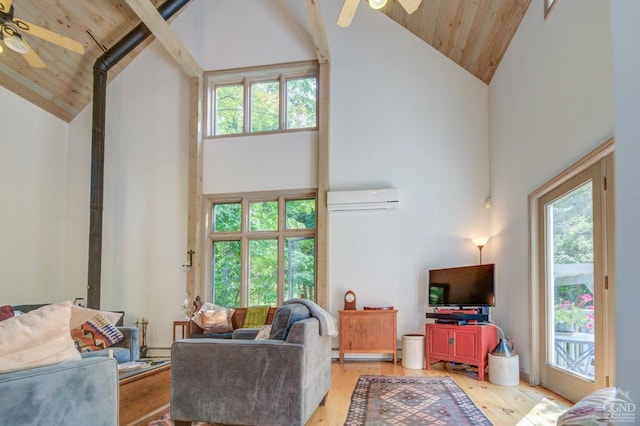 192 Old Queechy Rd, Canaan, NY 12029 - living room featuring a ceiling fan, high vaulted ceiling, a wall mounted AC, wood ceiling, and light wood finished floors