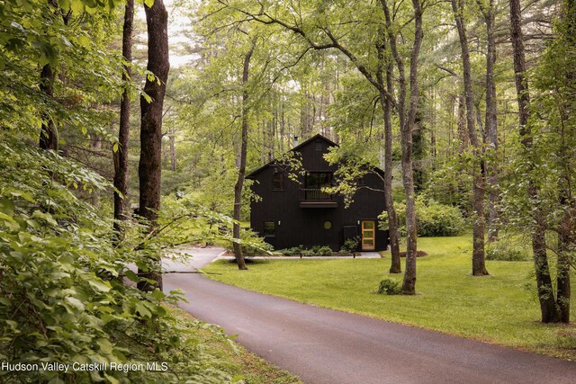 72 Old Queechy Rd, Canaan, NY 12029 - view of front facade with a wooded view, a front yard, and asphalt driveway