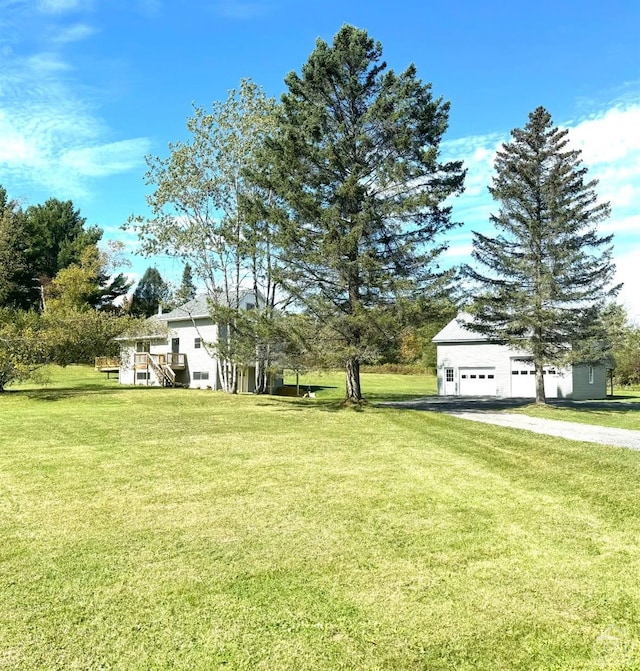369 Newry Ln, Greenville, NY 12083 - view of green lawn featuring stairs, asphalt driveway, and a wooden deck