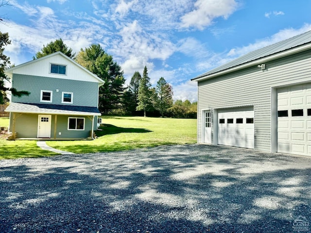 369 Newry Ln, Greenville, NY 12083 - view of property exterior with a garage and a lawn