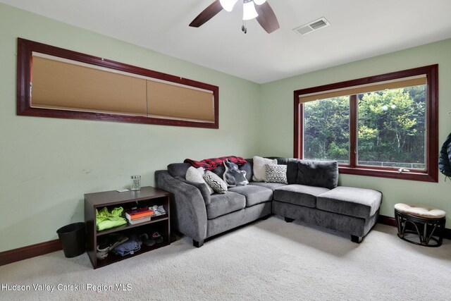 374 Linderman Ave, Kingston, NY 12401 - carpeted living room featuring a ceiling fan and baseboards