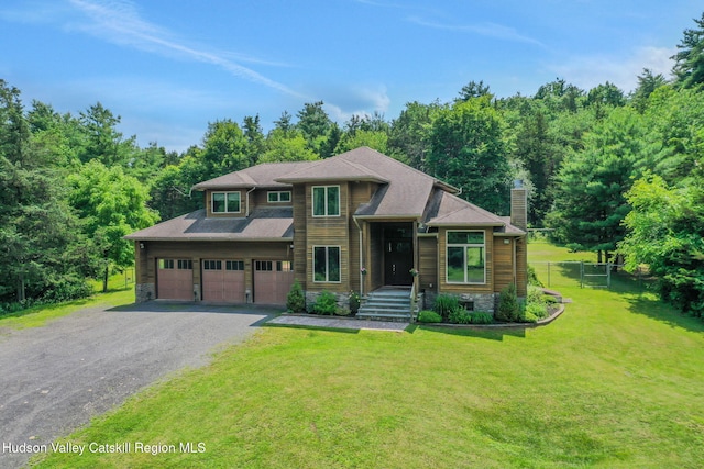374 Linderman Ave, Kingston, NY 12401 - view of front of home with a chimney, driveway, and stone siding
