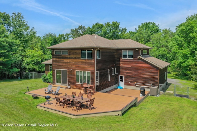 374 Linderman Ave, Kingston, NY 12401 - rear view of property with a fenced backyard, a wooden deck, a gate, and a shingled roof