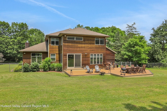 374 Linderman Ave, Kingston, NY 12401 - back of house with a deck, a chimney, roof with shingles, and outdoor dining space