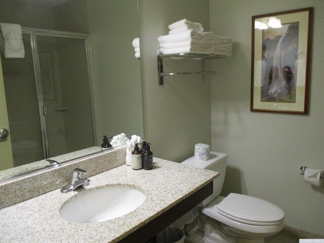 62 Liftside Dr Unit 306F1, Hunter, NY 12442 - bathroom with toilet, a shower stall, and vanity